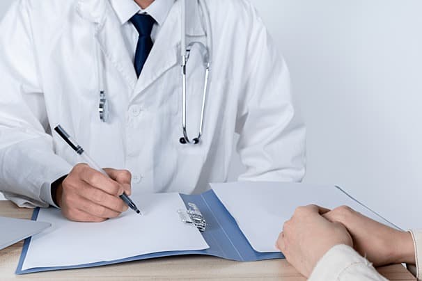 Doctor consulting with patient